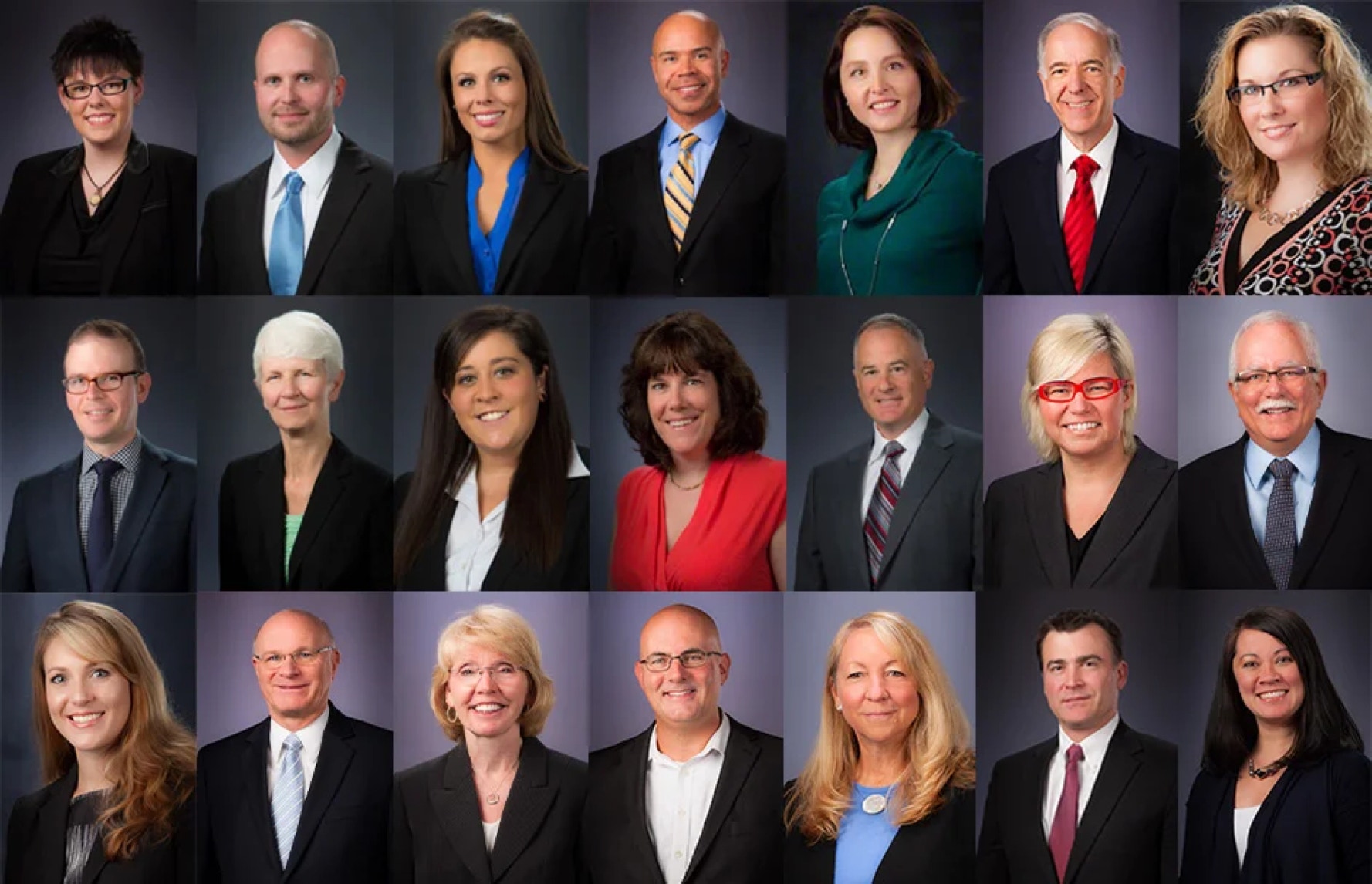 Economy Plus headshots of 21 different people